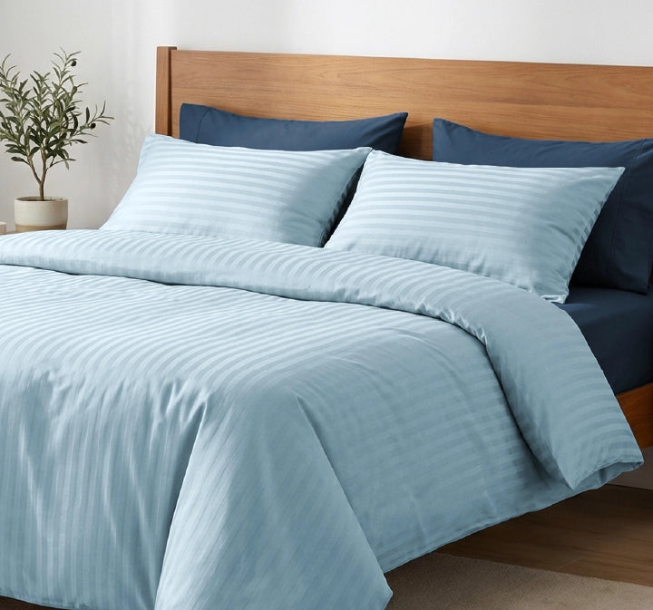 100% Cotton Pale Blue Striped Bedsheet With Navy Blue Solid Pillows